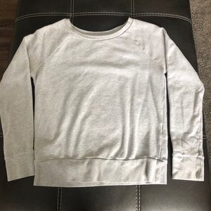 Women’s gray sweater.